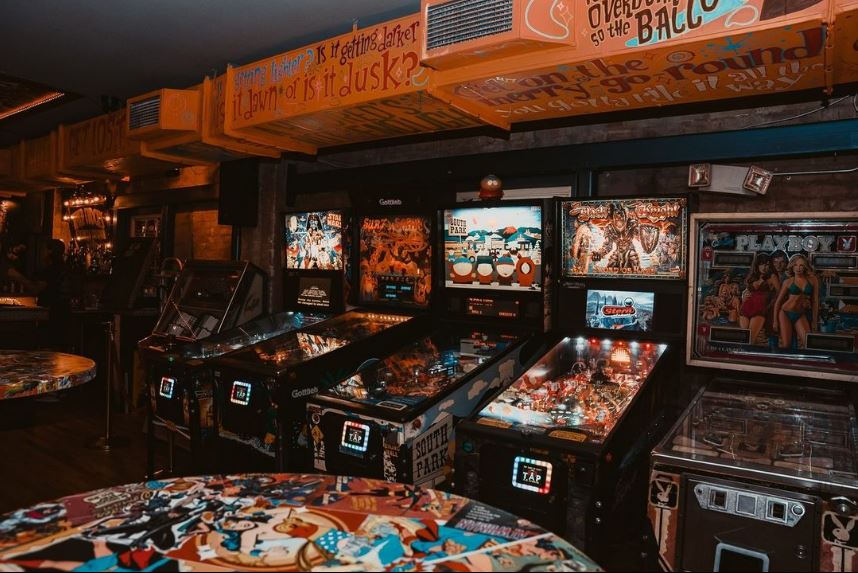 Lost Weekend — Clematis Street arcade dive bar with late-night crowd in West Palm Beach